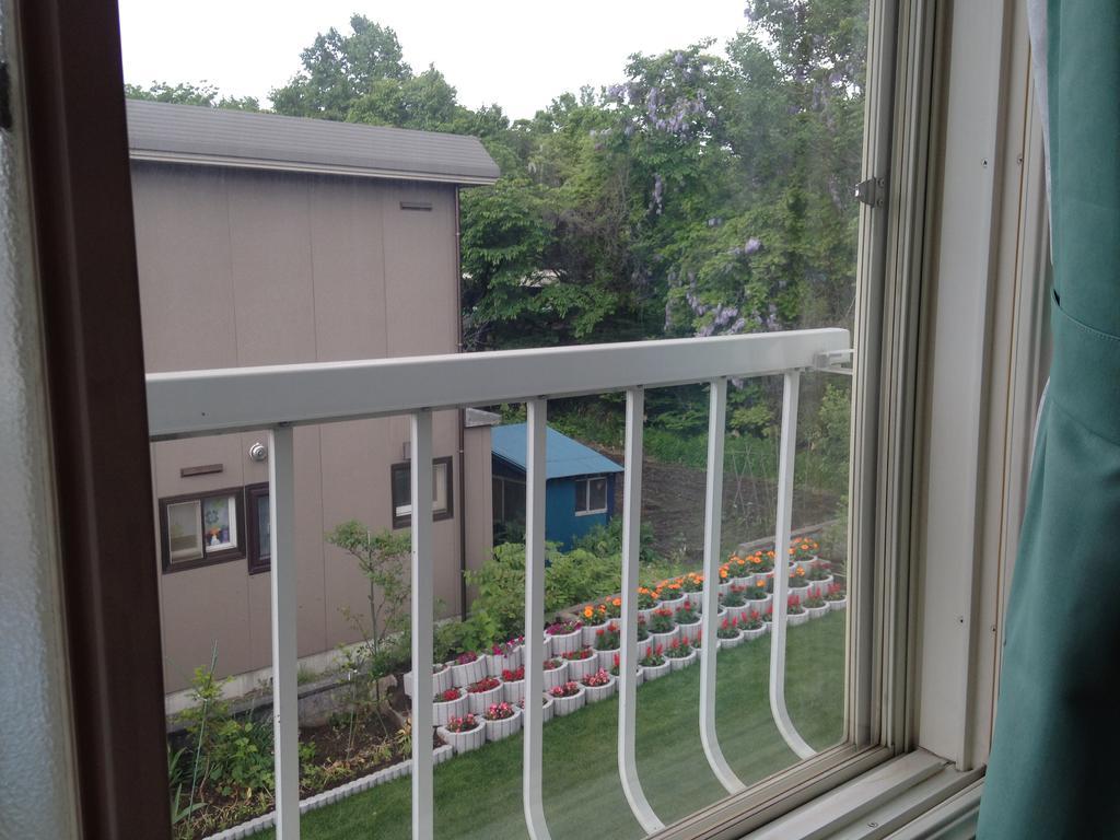 Koukaso Hotel Eniwa Buitenkant foto